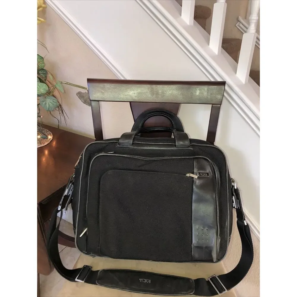 Tumi expandable leather